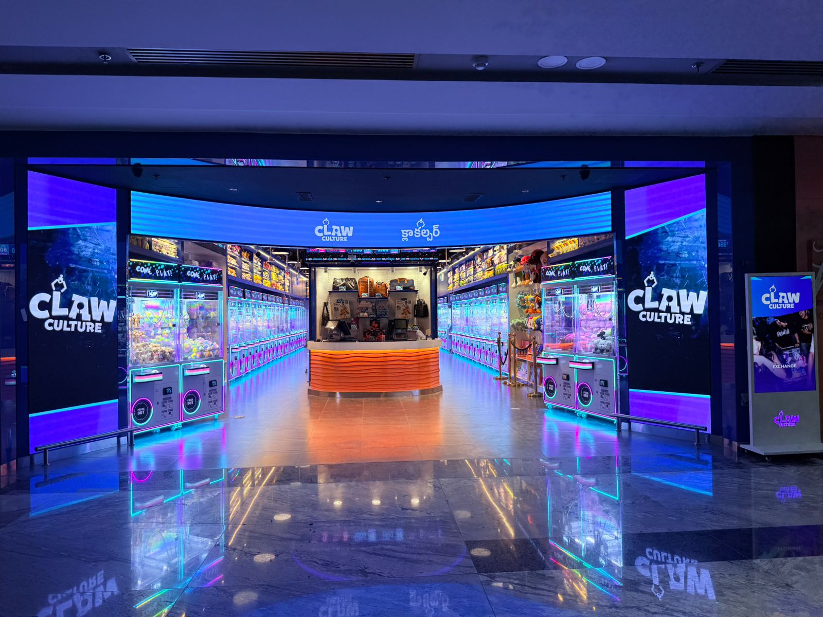 Claw Culture indoor gaming area with rows of colourful claw machines
